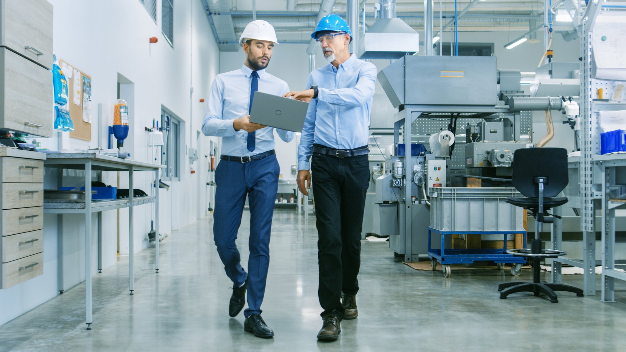 iStock-two men walking facility