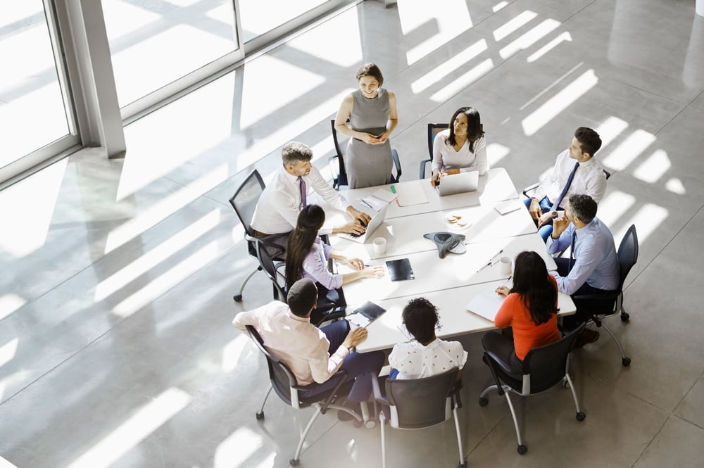 people meeting around table birdseye view people meeting around table birdseye view